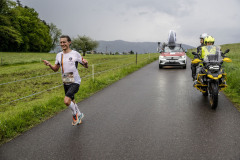 Men`s winner, Niklas Sjoeblom (L) of Sweden celebrates as he is about to be caught by the catcher car during the Wings for Life World Run Flagship Run in Zug, Switzerland on May 07, 2023.